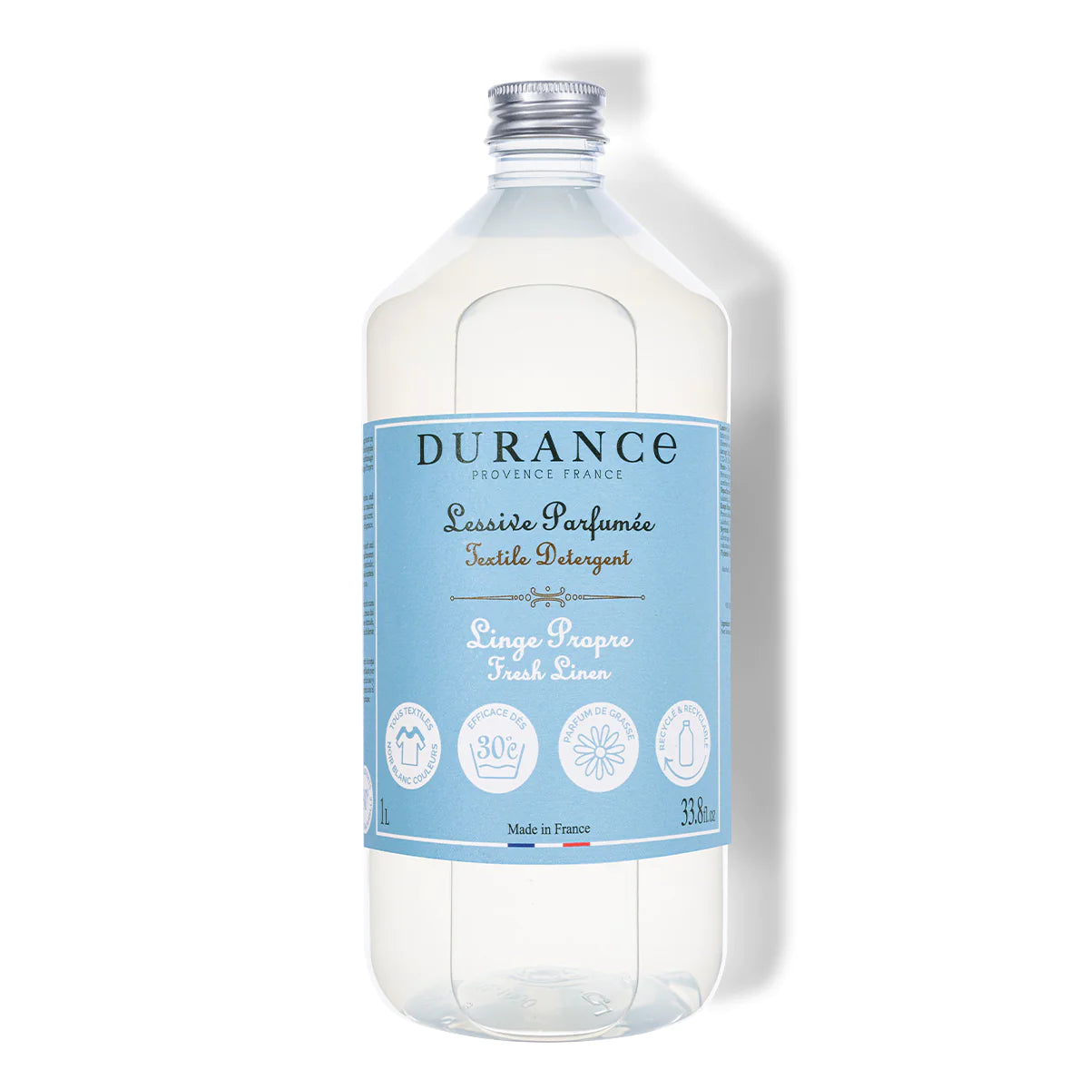 waschmittel frische waesche in durchsichtigem glas mit blauer aufschrift und silbernem drehverschluss. 1000 ml