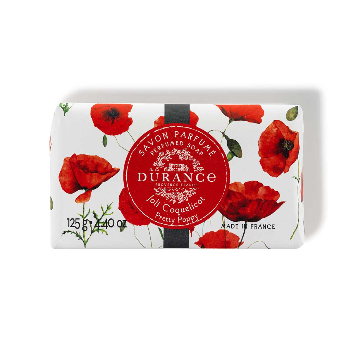 exclusives blumenpapier eingepackte seife duft schoene mohnblume hintergrund weiss