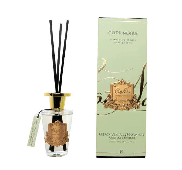 schwarze duftstaebchen im glas mit goldenem deckel und emblem. gruene verpackung. persian lime 150ml.